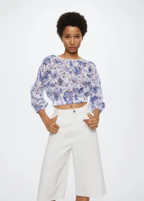Blusa dettagli traforati